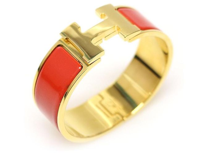 Hermès Bracciale Click Clack PM da donna in smalto corallo e placcato oro Rosso