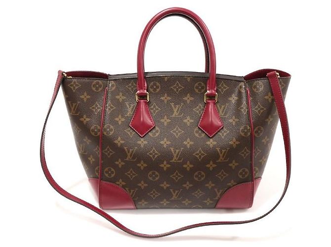 Louis Vuitton Monogram Canvas Fuchsia Phoenix MM Castaño