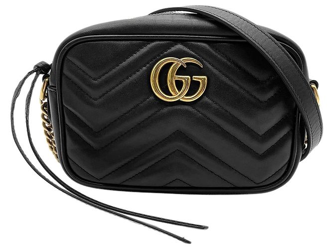 Marmont Bolsa de ombro matelassada Gucci com corrente Preto