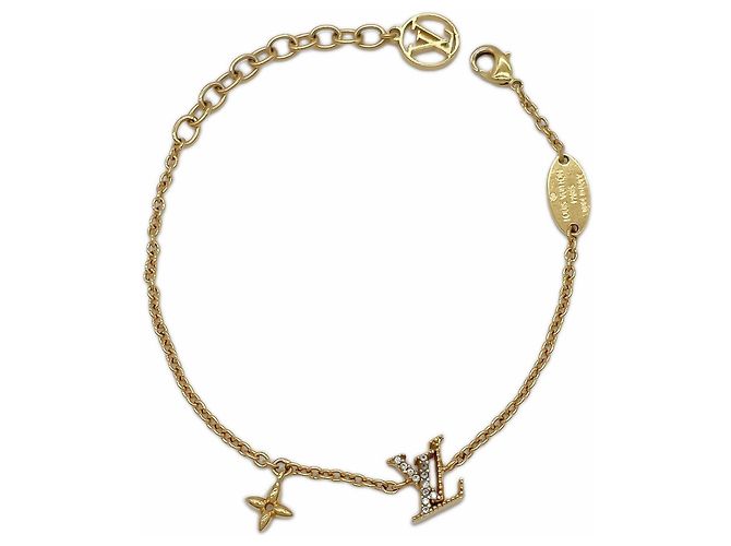 Pulseira charm em metal dourado Louis Vuitton