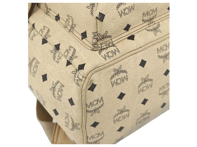 Mochila MCM Vicetos Logogram PVC Beige Oro Auth 179430 Dorado
