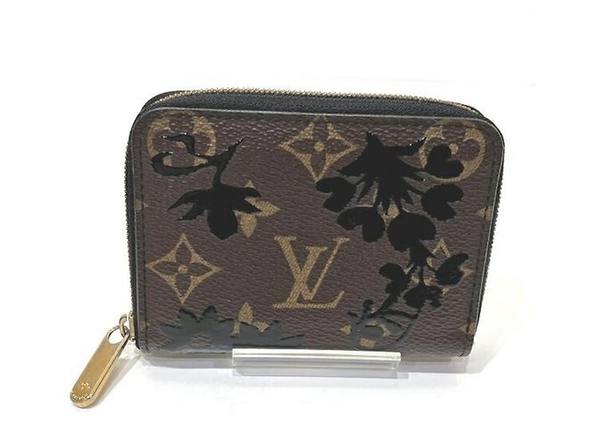 Porta-moedas Louis Vuitton Monogram Blossom Zippy Marrom Preto