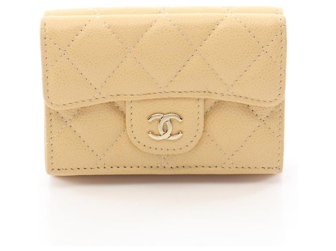 Cartera tríptico Chanel Classic Small Flap Beige