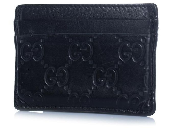 Gucci, black leather monogram embossed card holder