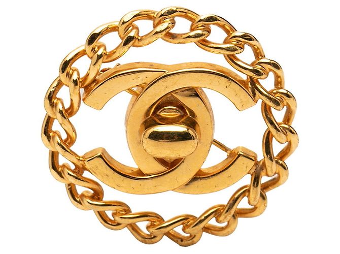 Spilla Chanel Coco Mark Vintage Turnlock Chain D'oro
