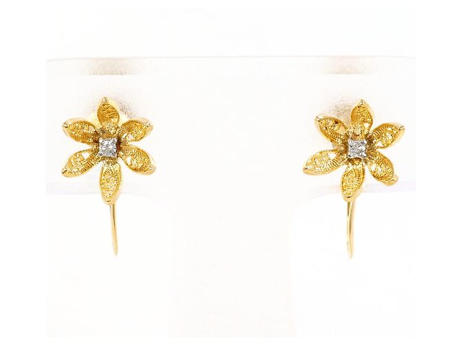 Autre Marque Orecchini a clip in oro giallo 18K e diamanti D'oro