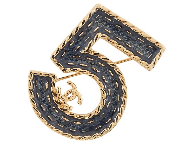 Broche Chanel No. 5 Dourado