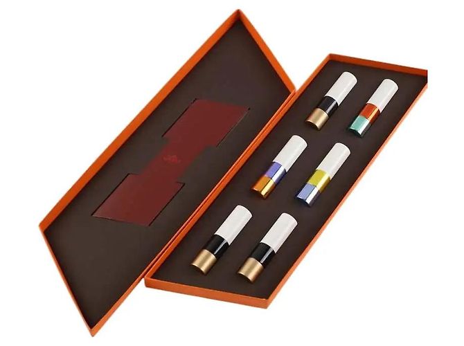 Hermès Lipstick set with book Orange