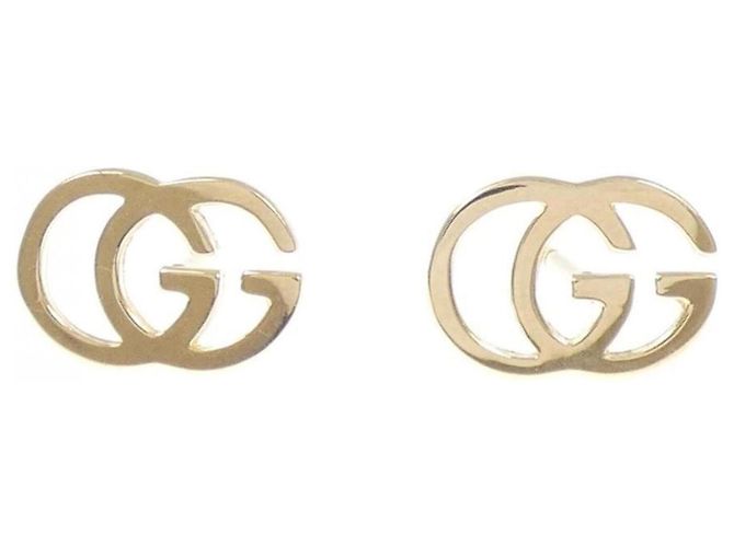 Orecchini Gucci GG Stud in oro giallo 18K