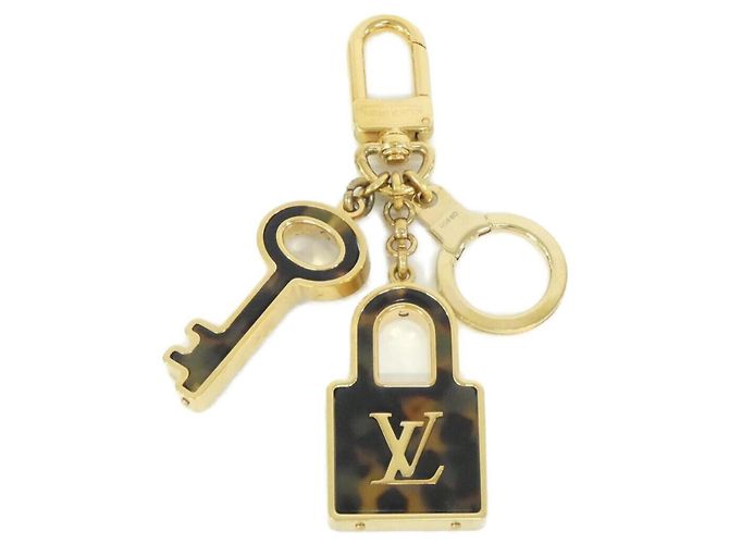 Portachiavi Confidence Louis Vuitton Marrone D'oro