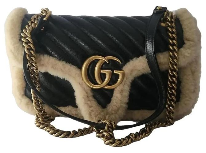 Borsa a tracolla Gucci Marmont in pelle nera e shearling Nero