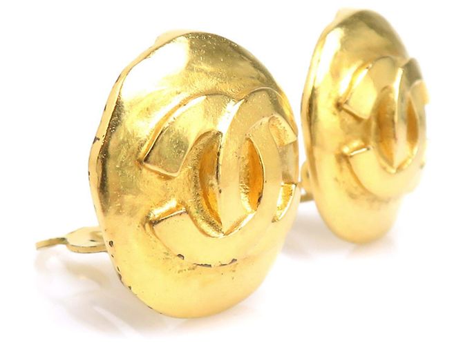 Boucles d'oreilles à clip dorées Chanel