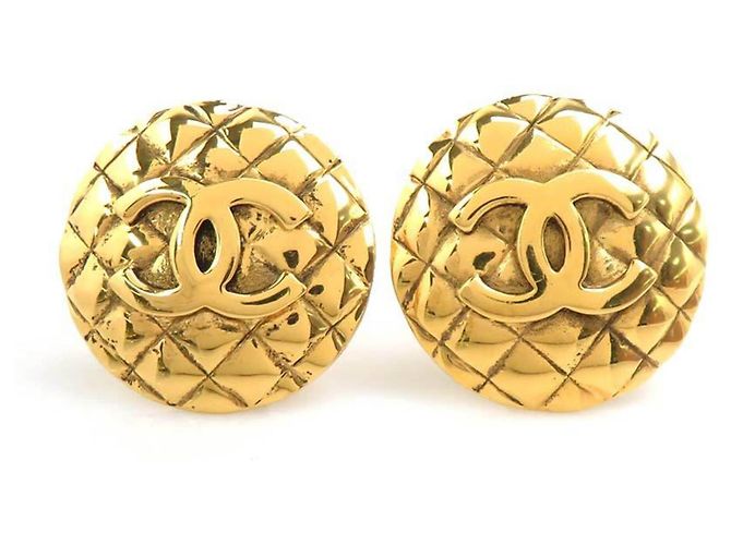 Boucles d'oreilles à clip dorées Chanel