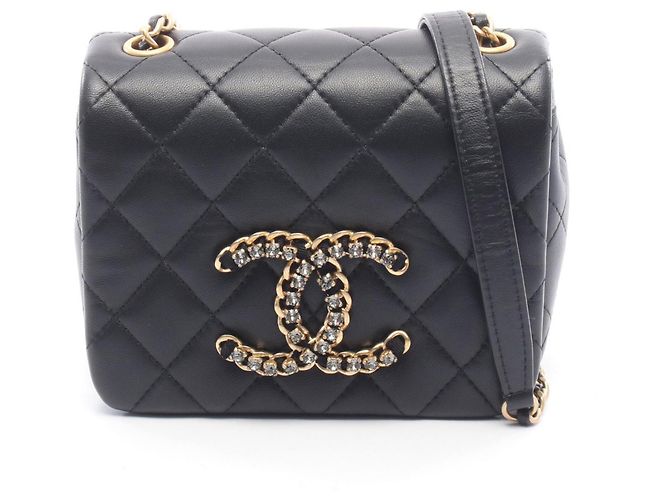 Chanel Matelassé Lammfell Handtasche Schwarz
