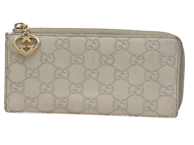 Cartera Gucci Interlocking G con cierre de cremallera (Outlet) de cuero larga Beige