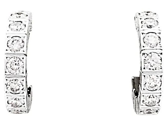 Orecchini Cartier, "Lanière", oro bianco e diamanti. Piccolo modello.