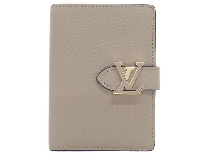 Cartera Compacta Louis Vuitton Taurillon LV Vertical