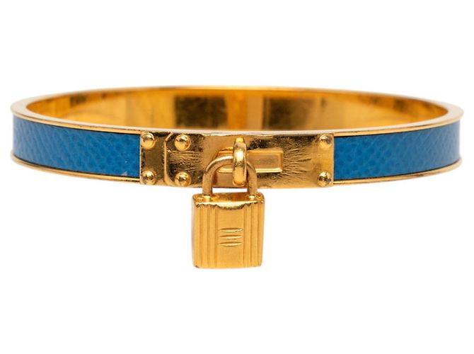 Bracciale Kelly di Hermès in blu e oro D'oro