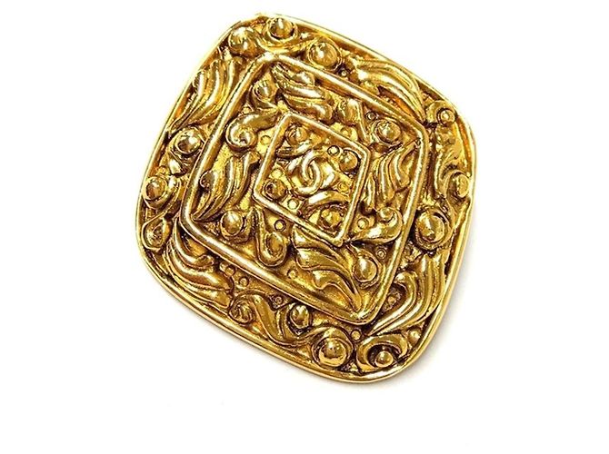 Spilla Chanel Vintage Coco Mark Arabesque D'oro