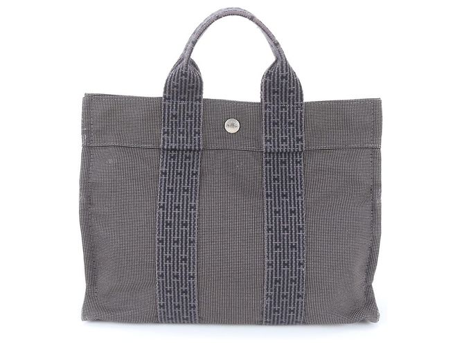 Hermès Sac cabas en toile et cuir Herline Hermes Marron Noir