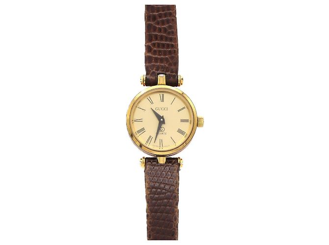 Reloj de cuarzo Gucci Sherry Line chapado en oro