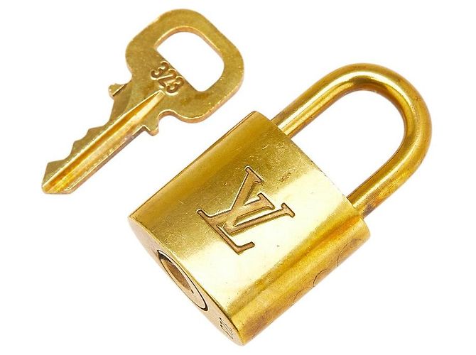 Set lucchetto e chiave Louis Vuitton D'oro Metallico