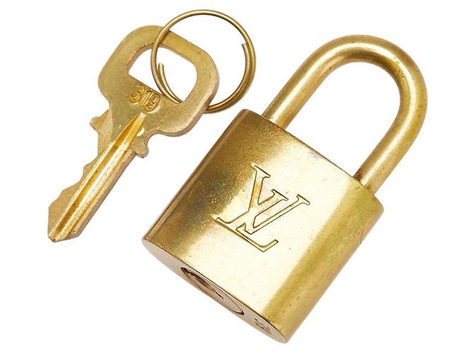 Juego de llaves de candado Louis Vuitton Dorado Metálico