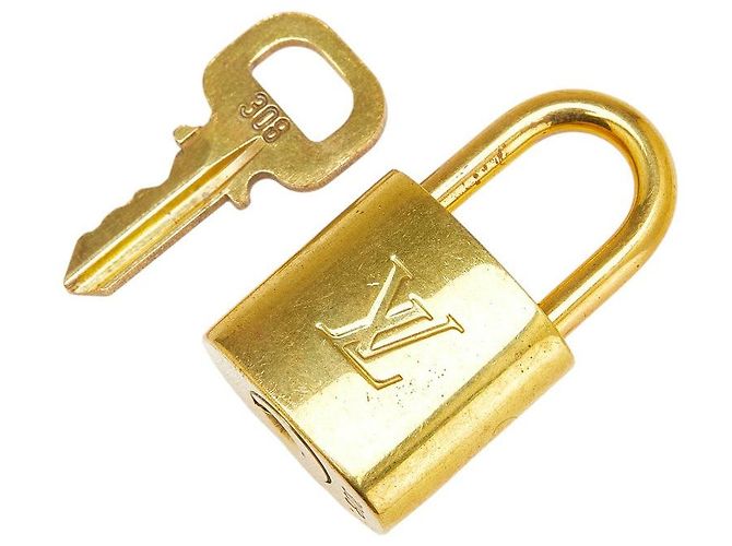 Set lucchetto e chiave Louis Vuitton D'oro Metallico