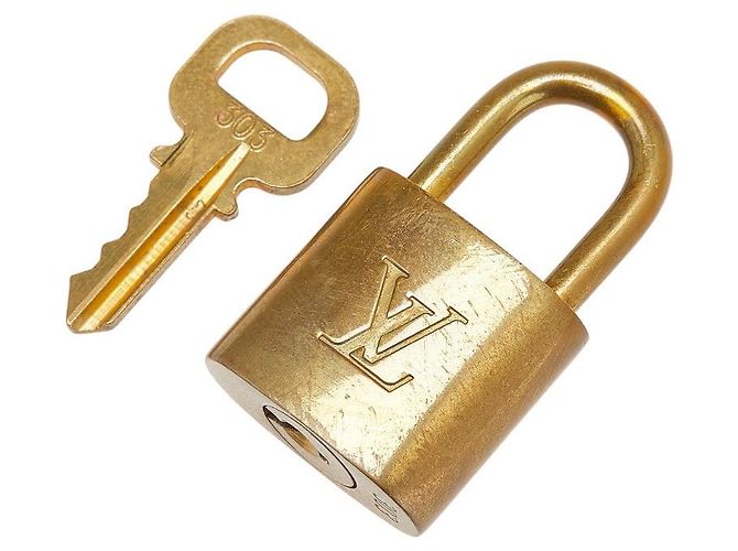 Set di lucchetto e chiave Louis Vuitton Accessorio D'oro Metallico