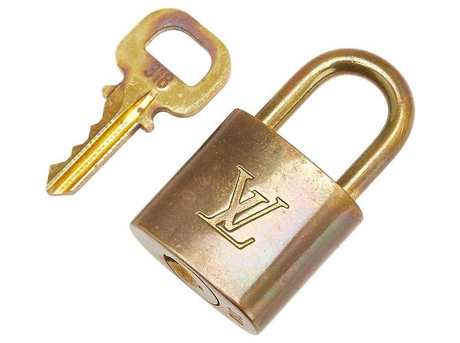 Set lucchetto e chiave Louis Vuitton Accessorio D'oro Metallico
