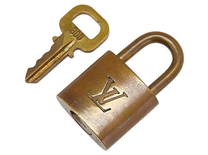 Set di chiavi per lucchetto Louis Vuitton D'oro Metallico