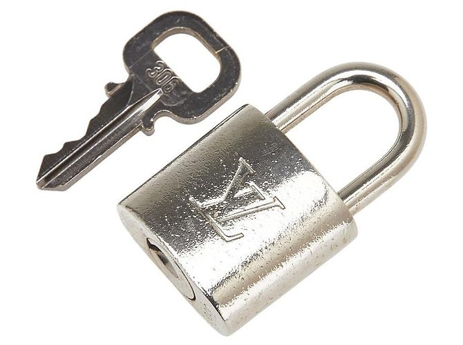 Set lucchetto e chiave Louis Vuitton Accessorio in metallo Argento Metallico