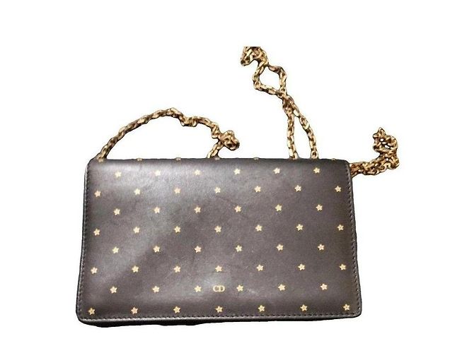 Dior Lederclutch Schwarz Goldene Sterne