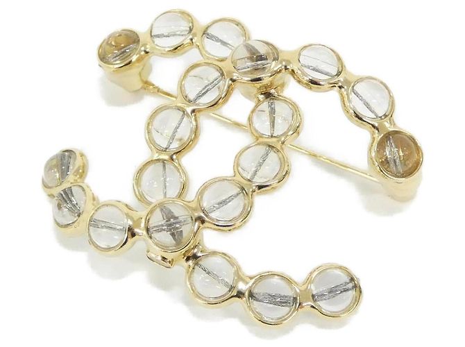 Spilla Chanel Clear e Gold D'oro