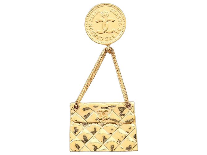 Spilla Chanel placcata oro D'oro