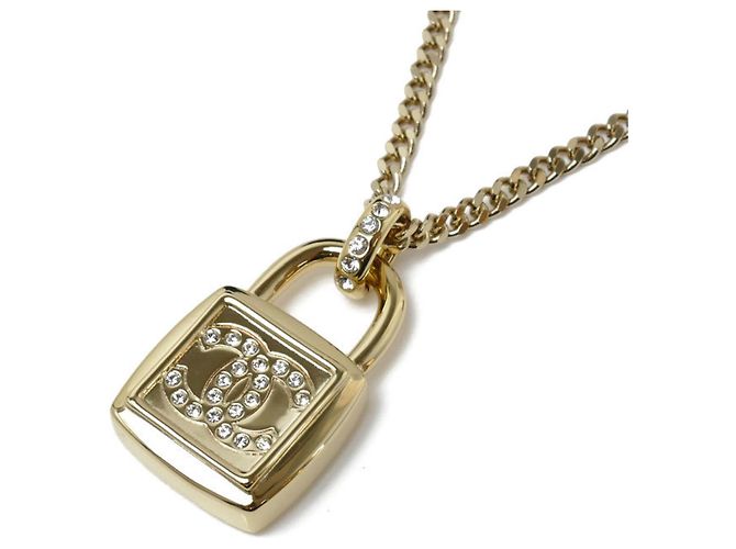Collana lunga con pendente a lucchetto in metallo CHANEL
