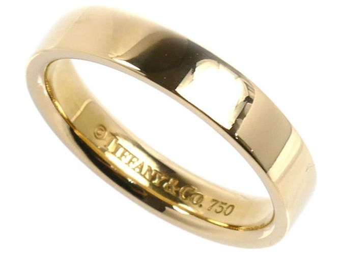 Tiffany & Co Anillo Tiffany de oro amarillo de 18K de banda plana