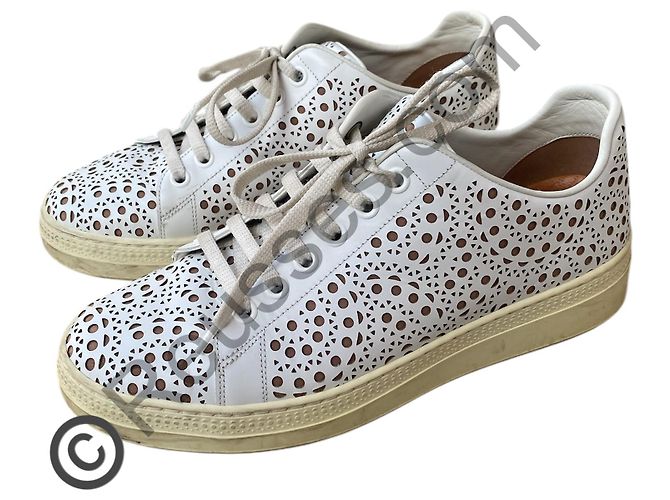 Alaïa laser cut sneakers