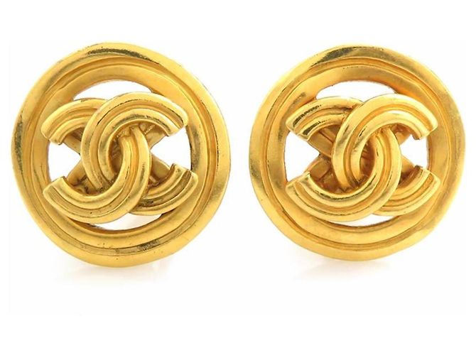 Boucles d'oreilles à clip dorées Chanel