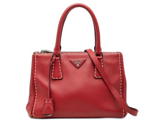 Borsa a mano Prada in pelle di vitello rosso con placca logo Triangle