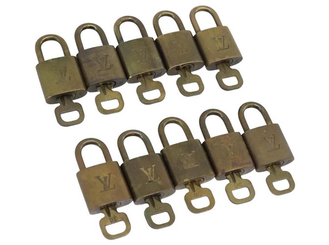 LOUIS VUITTON Set di 10 lucchetti Padlock metallo Oro LV Auth 173149 D'oro