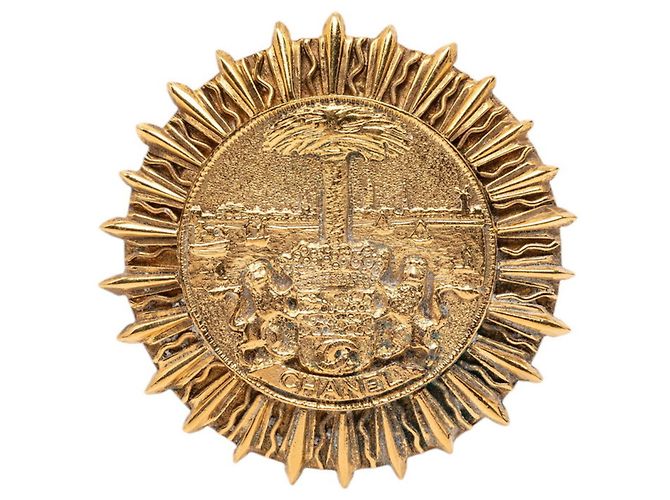 Spilla Chanel Coco Mark placcata oro D'oro