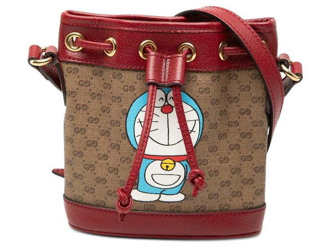 Bolso Bucket Mini GG Supreme Gucci x Doraemon Castaño Roja