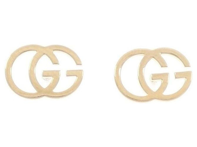 Orecchini Gucci GG Stud in oro giallo 18K