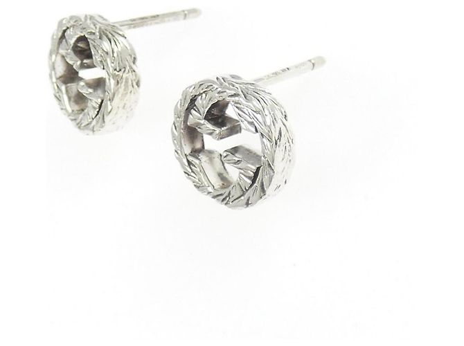 Pendientes de botón Interlocking G en plata Gucci