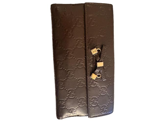 Gucci GG embossed brown leather long wallet