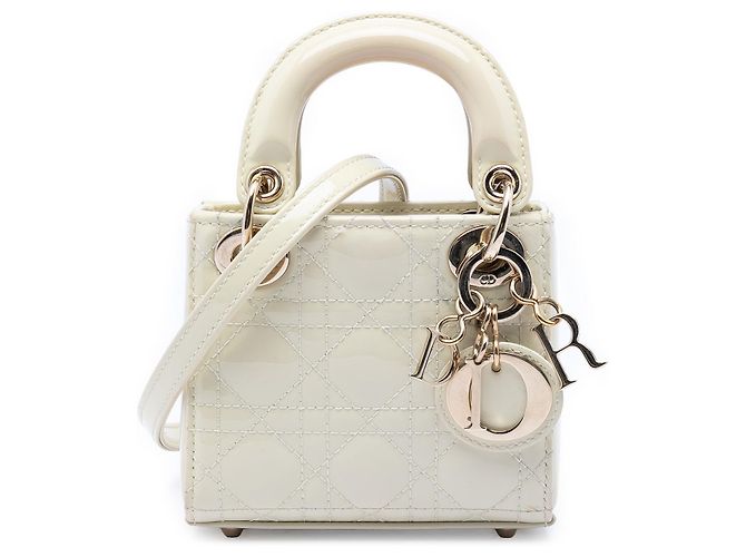 Lady Dior em micro verniz branco cannage Cru