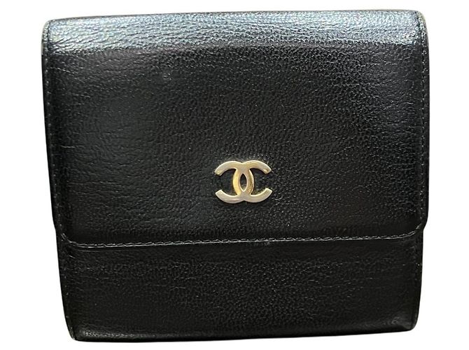 Cartera tríptico Chanel en cuero negro