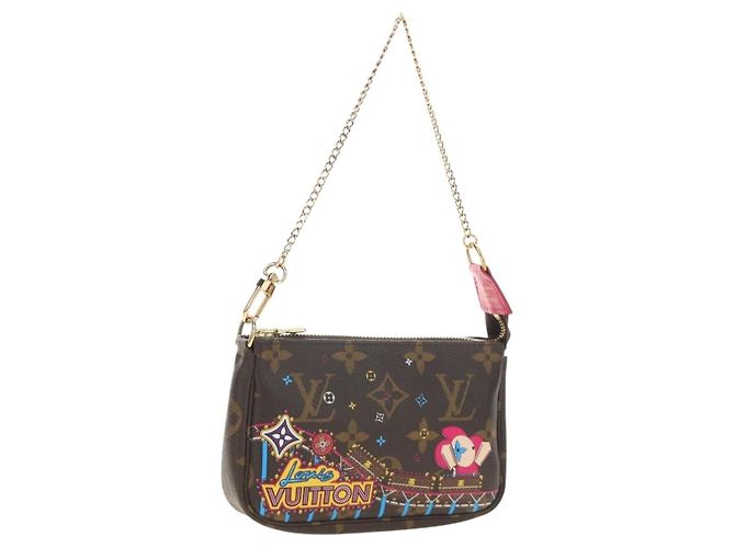 LOUIS VUITTON Monogram Vivienne Mini Pochette Accessoires M69752 Auth 184588SAM