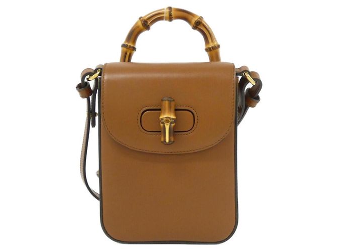 Bolsa de mão Gucci em couro marrom